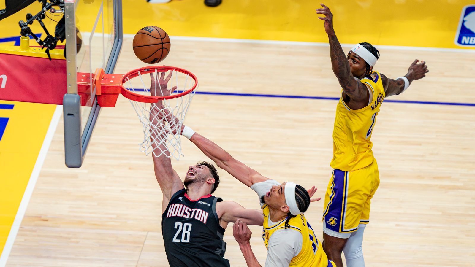 Rockets center Alperen Sengun (28) leaping for a lay up