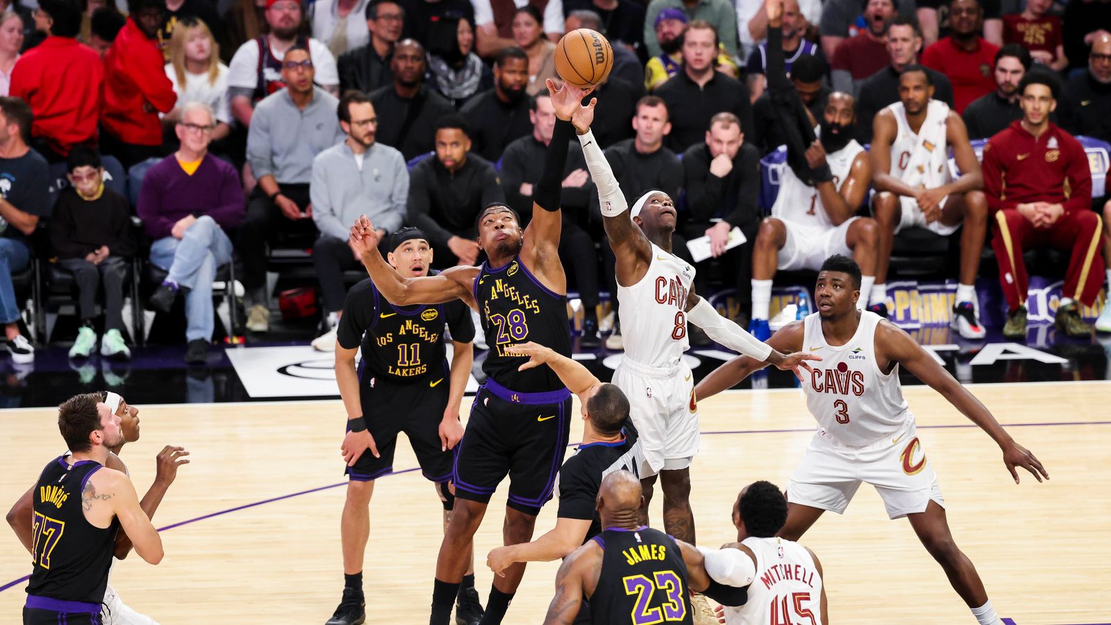 Vertical Battle: Rui Hachimura and Dennis Schroder fight for a jump ball