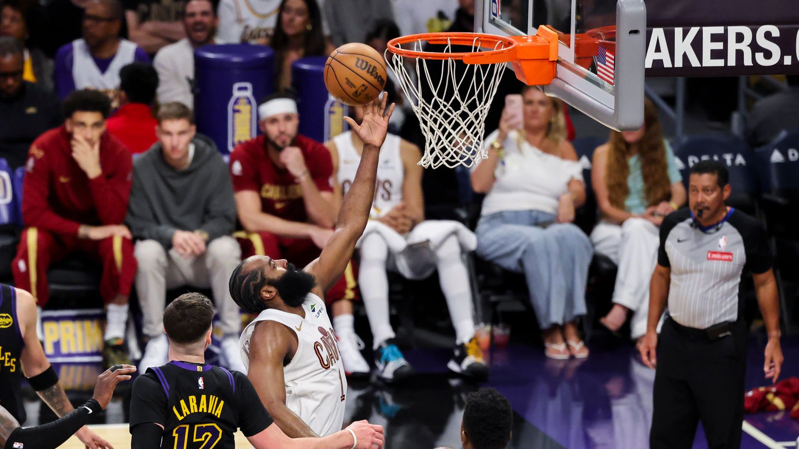 The Beard in LA: James Harden finishes a layup at the cup