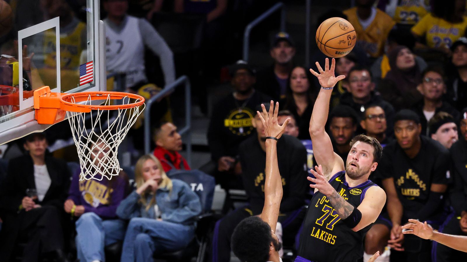 Playmaker at Work: Luka Dončić lofts a perfect lob for a teammate