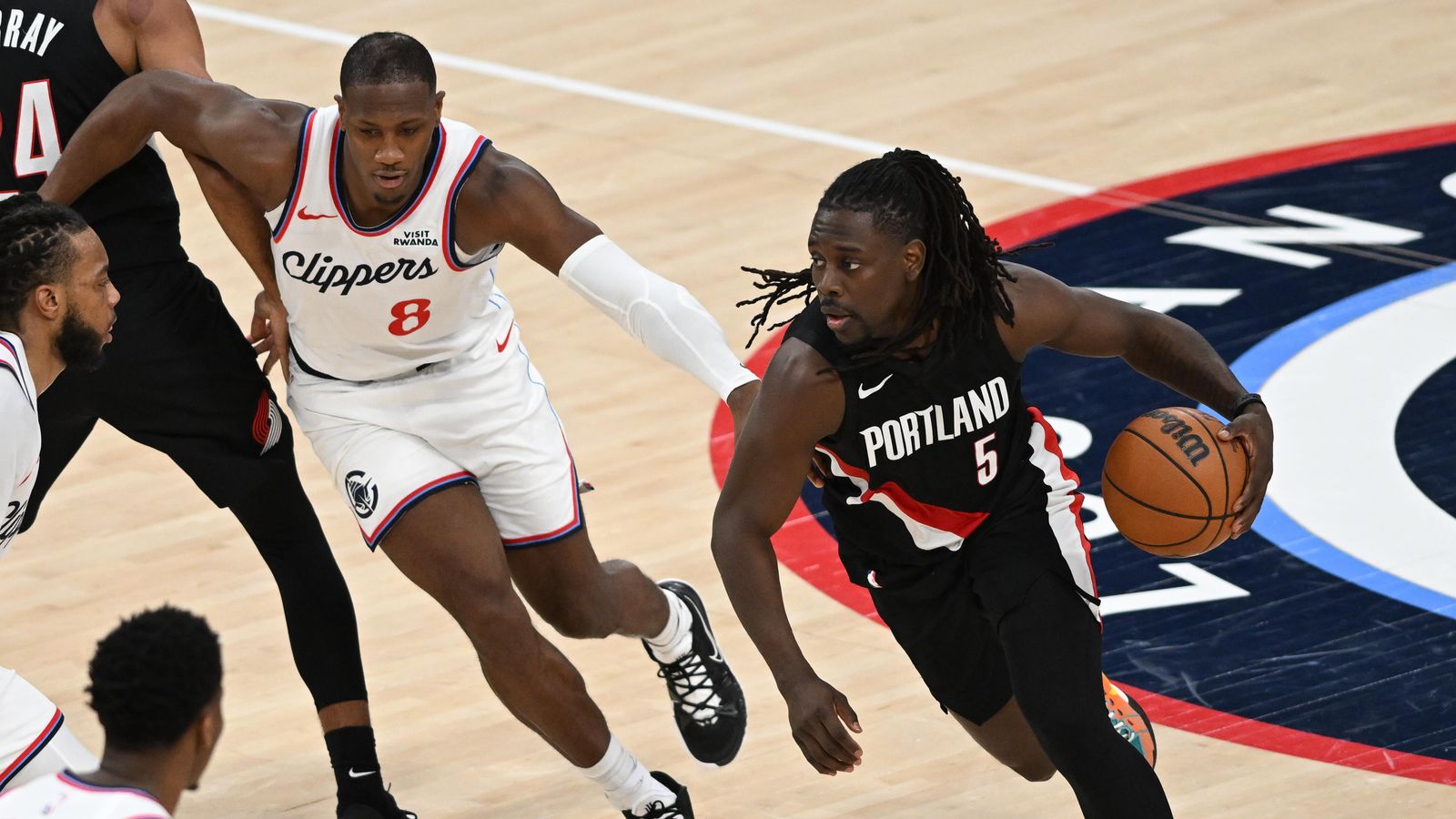 Experienced Drive: Jrue Holiday puts his head down and attacks the paint