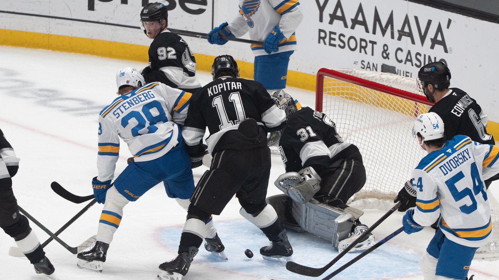 Through the Screen: Forsberg tracks the puck through a crowded crease