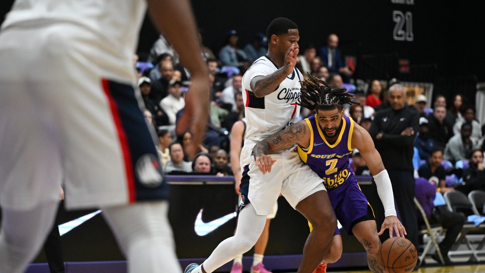 Hard-Earned Trip: RJ Davis draws the foul on a strong drive