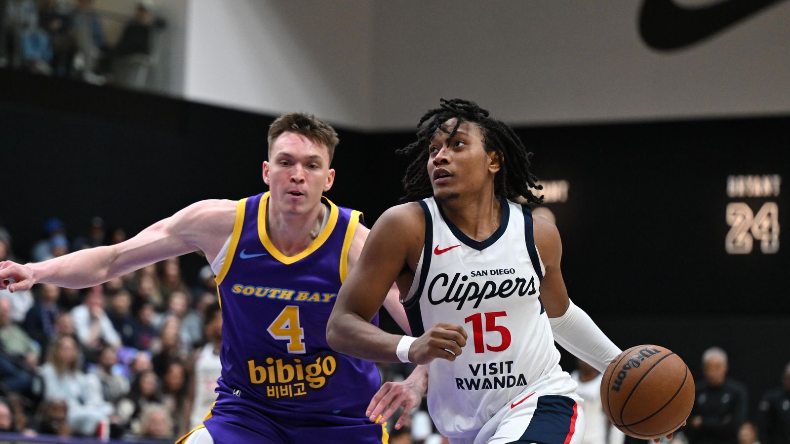 To the Cup: TyTy Washington Jr. maneuvers toward the basket