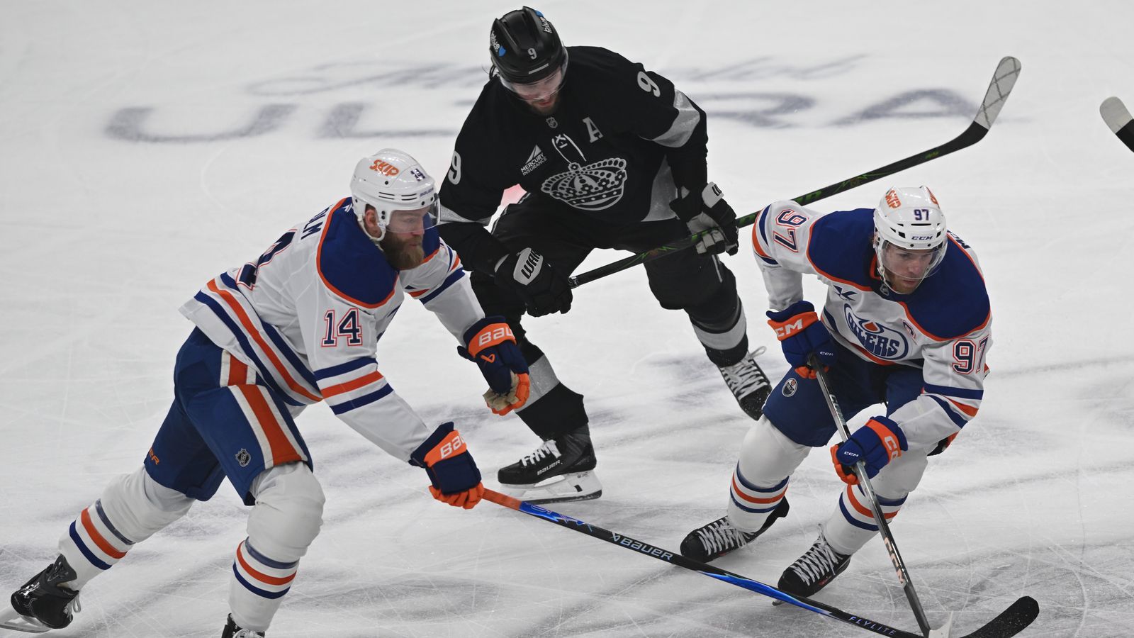 Kings Adrian Kempe (9) battles for possession