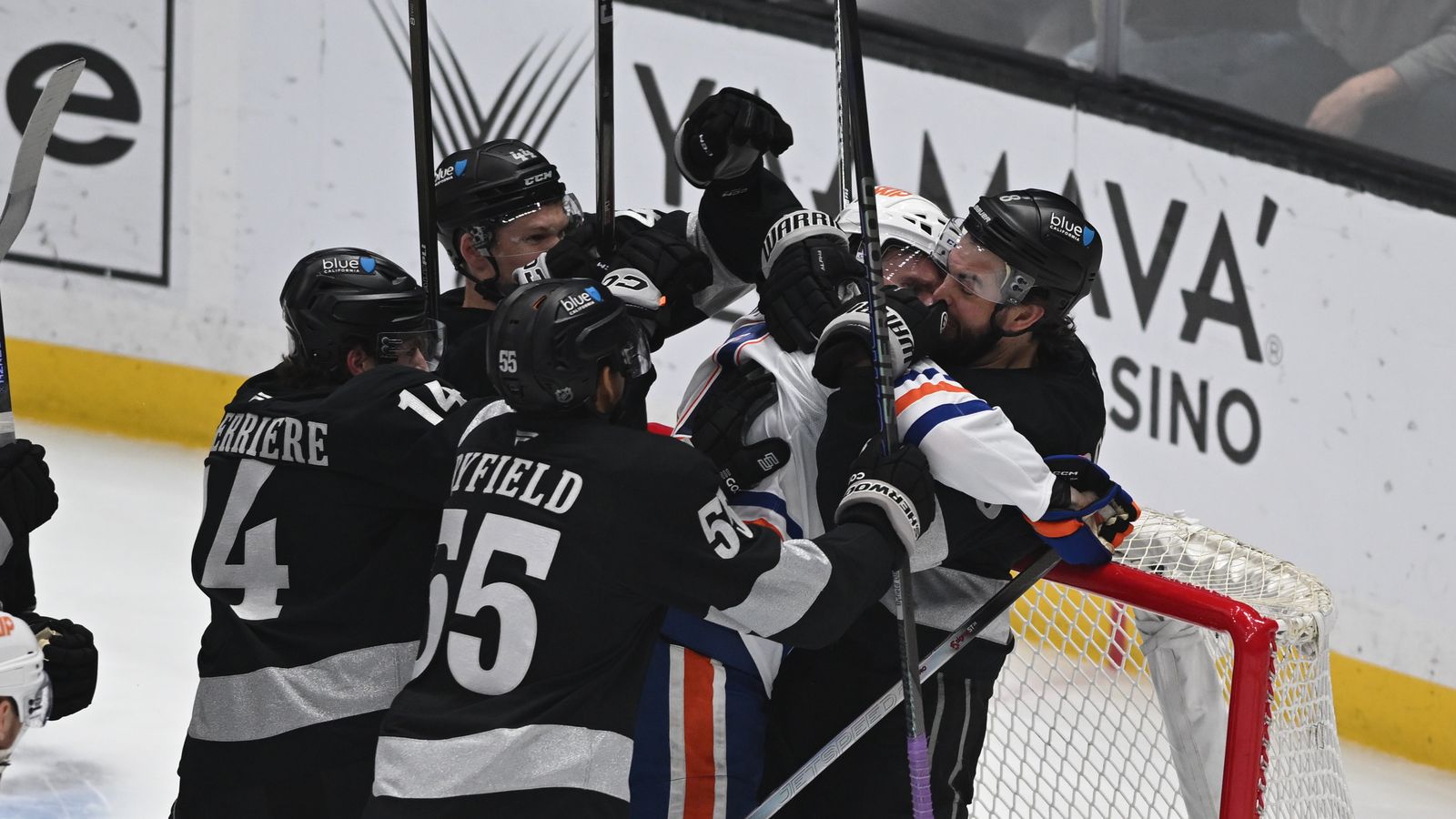 A fight breaks out at the Oilers net