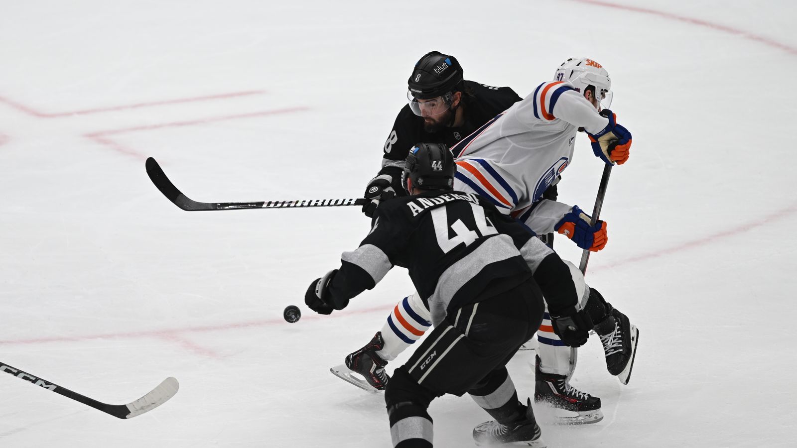 Kings Mikey Anderson (44) and Drew Doughty (8) take possession of the puck