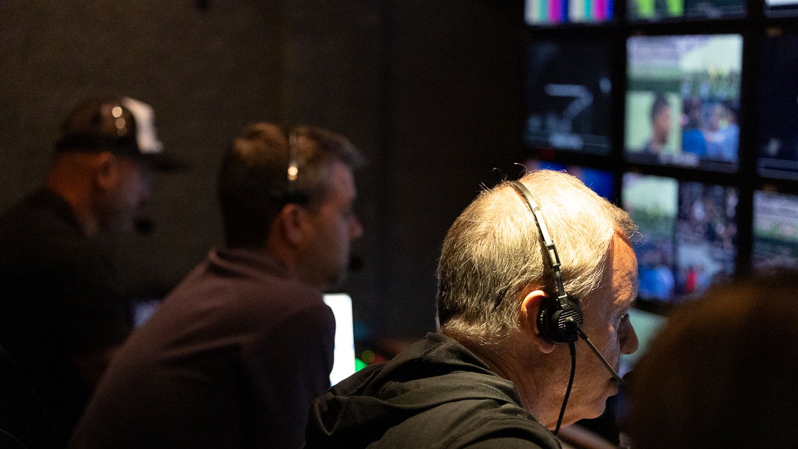 Brad Merte (producer) and Jim Dadonna (director) prepare for a MLS match