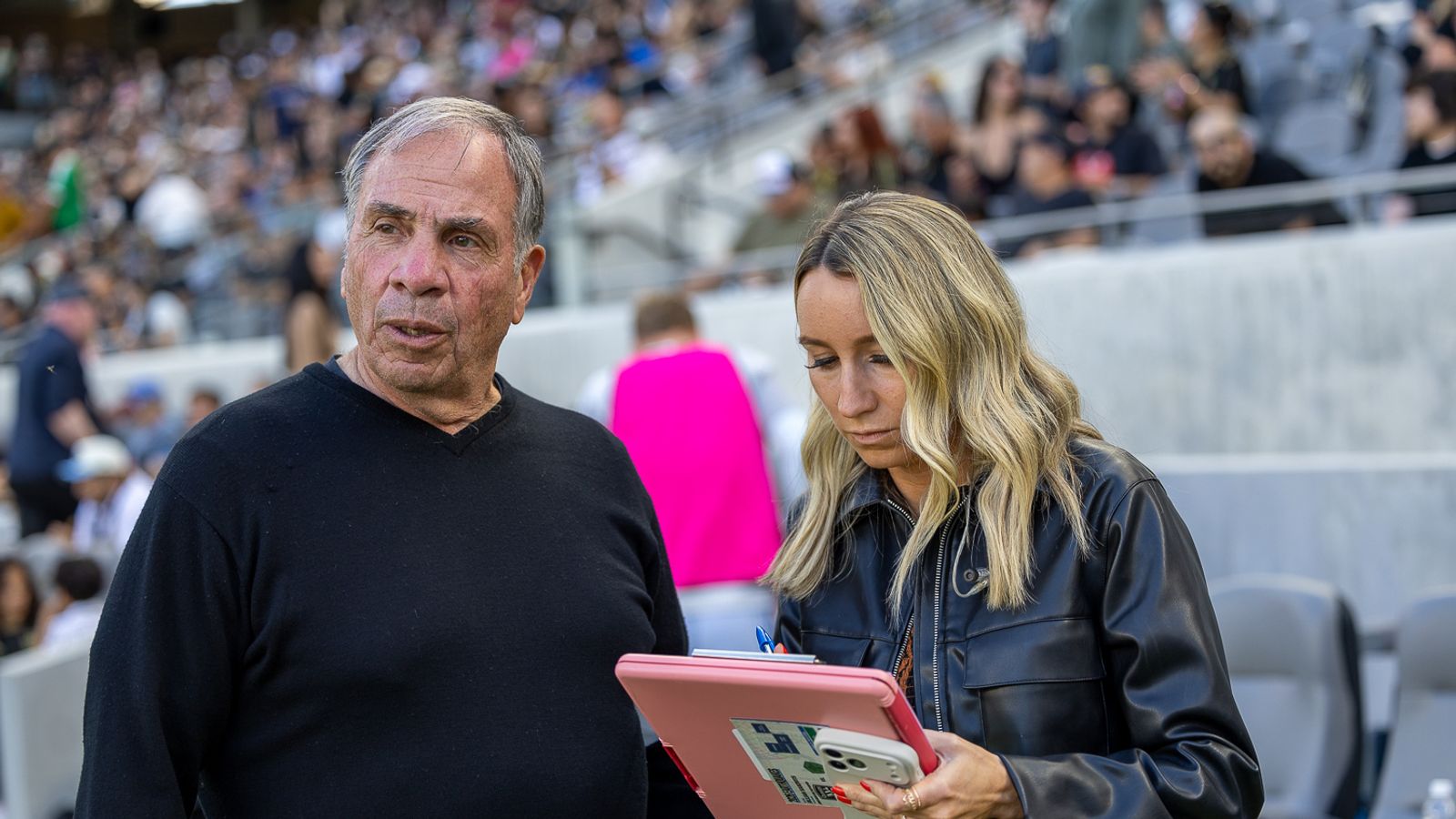 Jillian Sakovits (host and sideline reporter) speaks with San Jose Earthquakes head coach Bruce Arena
