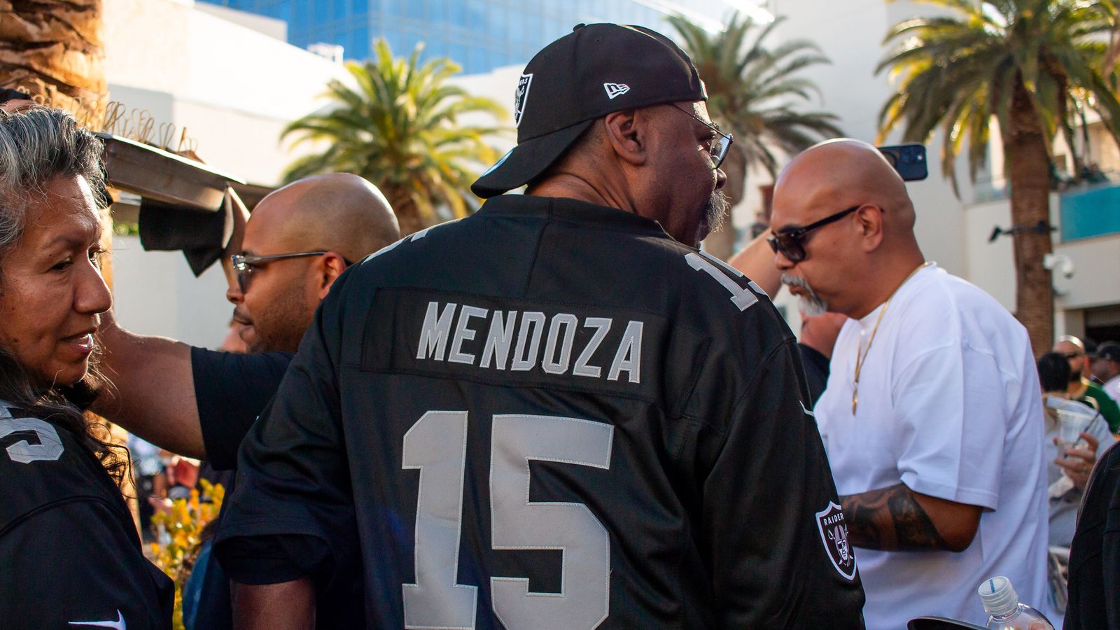 Fan Wears Fernando Mendoza Jersey at Las Vegas Draft Celebration