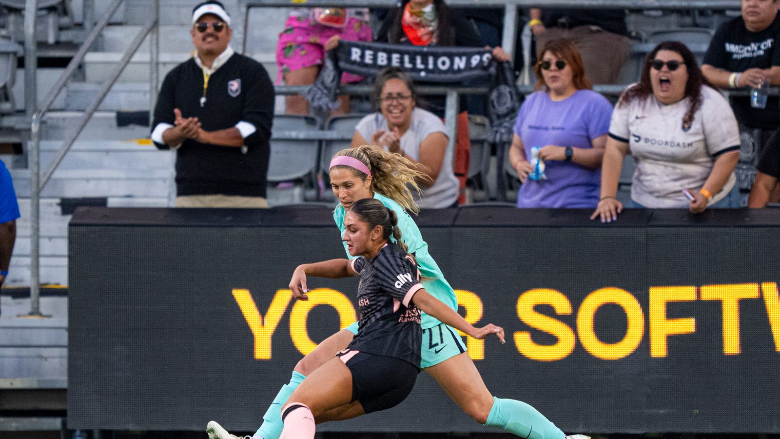 Emily Sams fights to maintain possession for Angel City FC