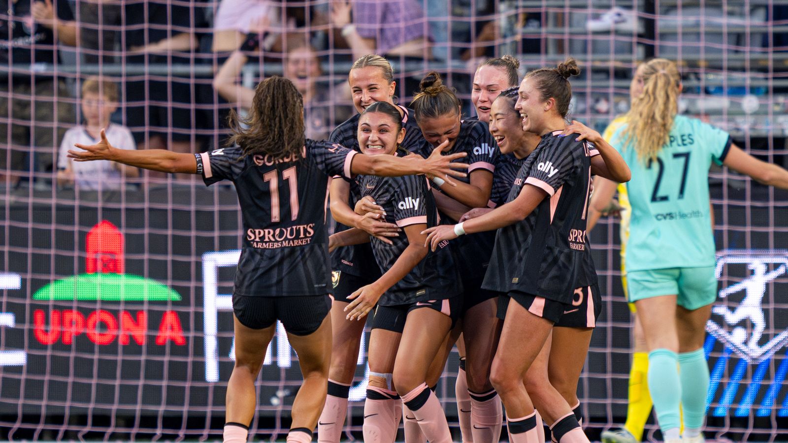 Gisele Thomson celebrates a goal against Kansas City Current