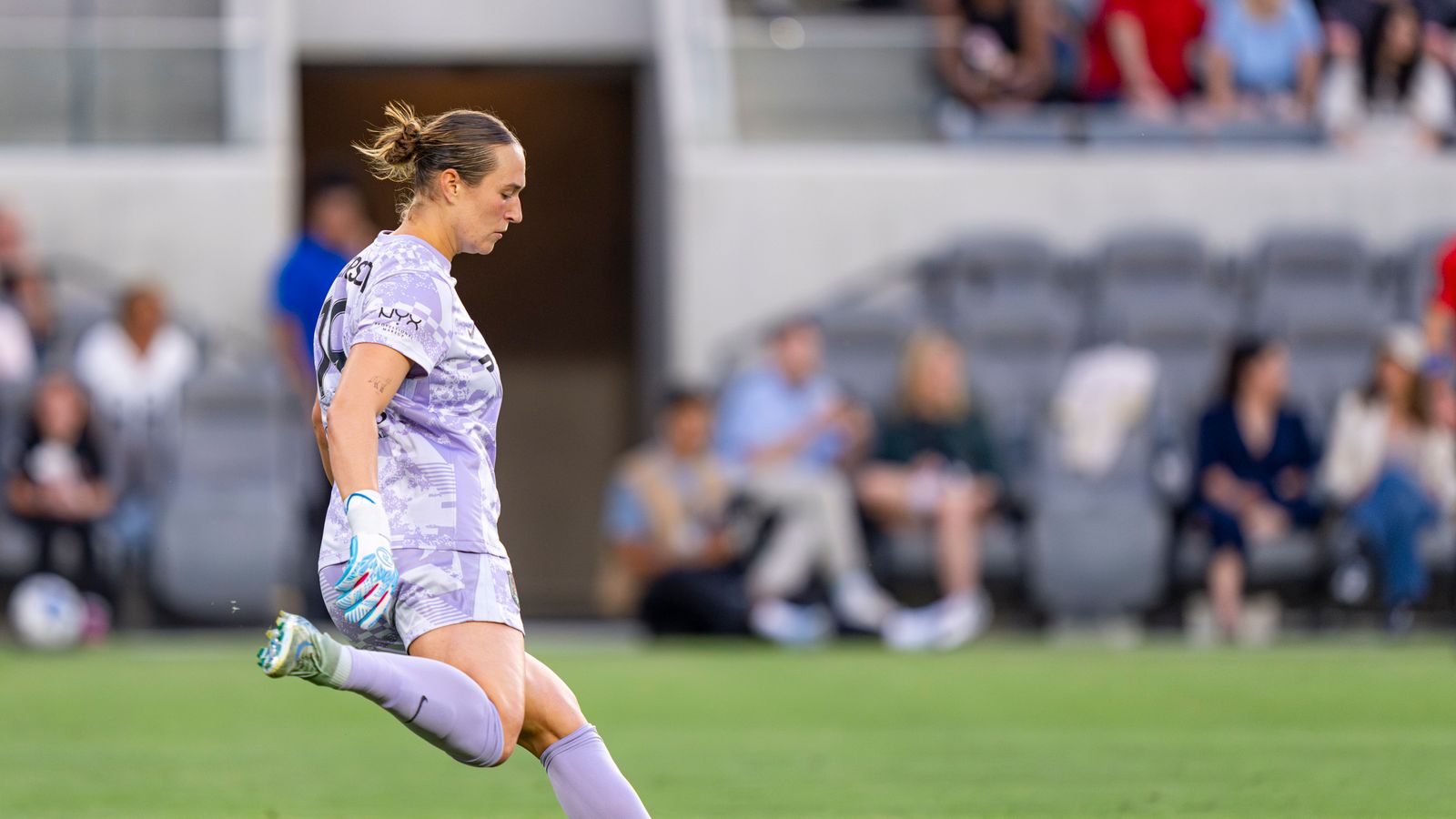 Goalkeeper Angela Anderson punts the ball in NWSL game