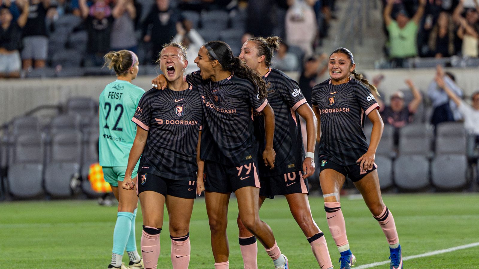 Kennedy Fuller celebrates scoring in NWSL match