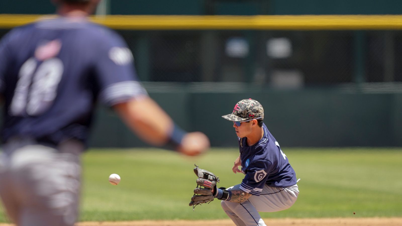 Cody Kashimoto fields a throw at Jackie Robinson Stadium