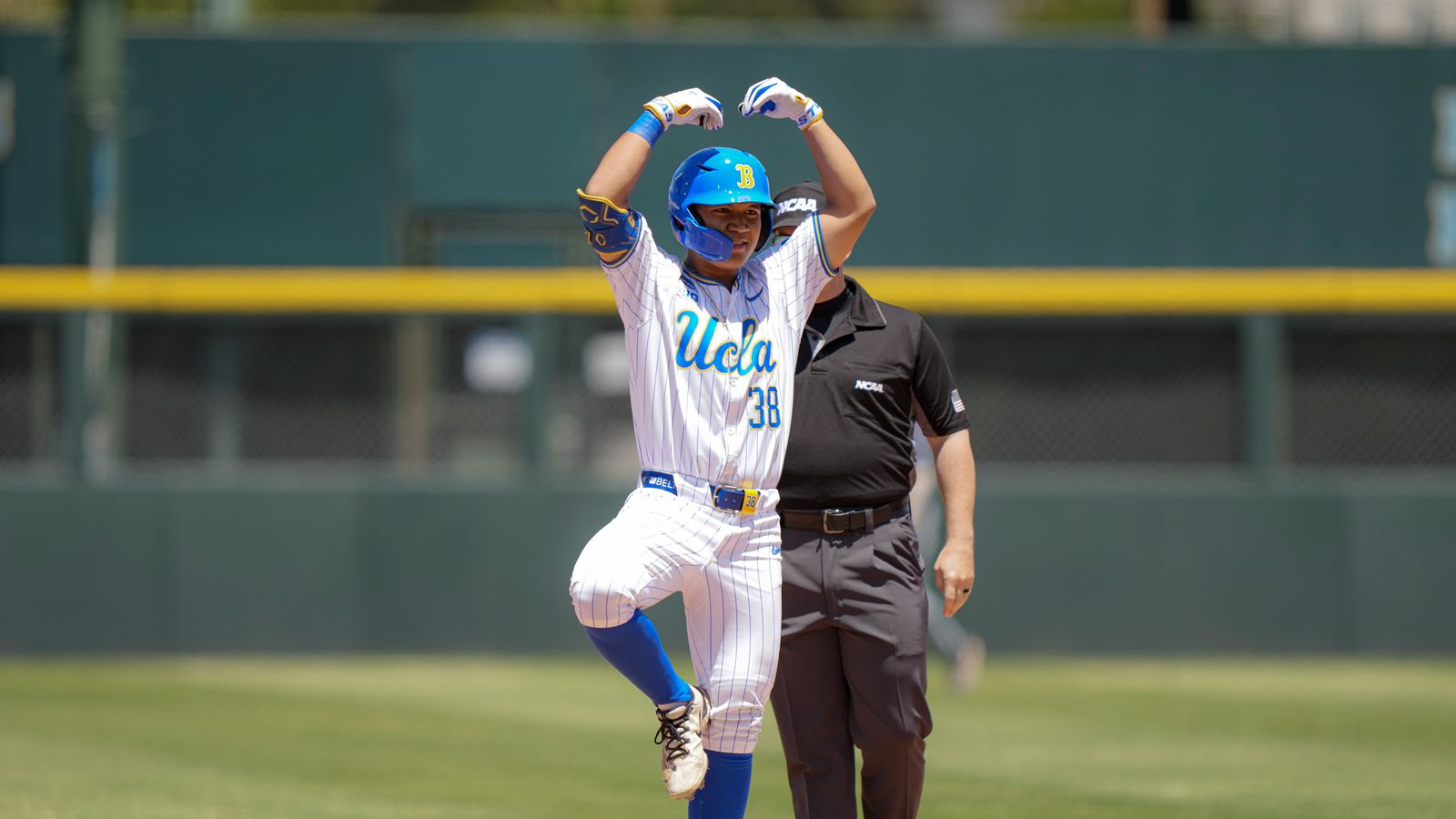 Trey Gudoy celebrates a double at Jackie Robinson Stadium
