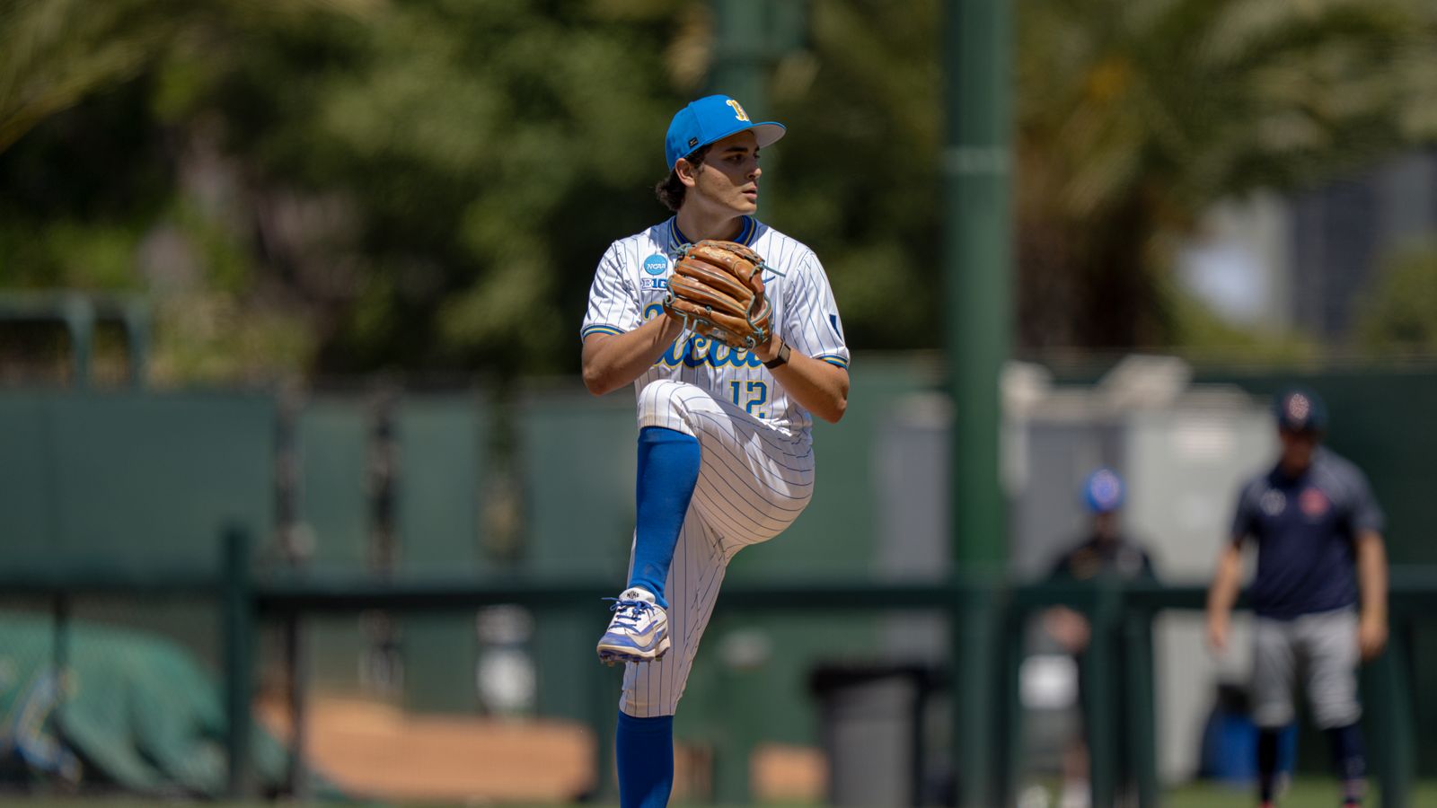 Zach Strickland pitching in NCAA game