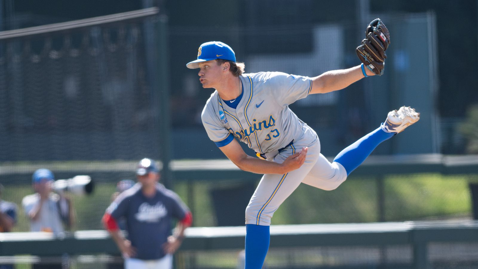 Cal Randall delivers a pitch in a tense NCAA game