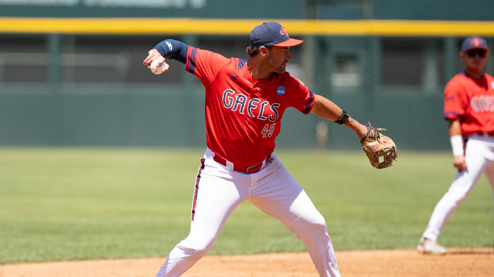 Jared Mettam in action, throws during NCAA game