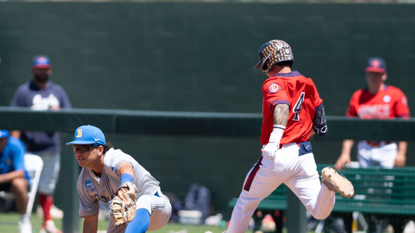 Mulivai Levu makes an outfield catch for UCLA