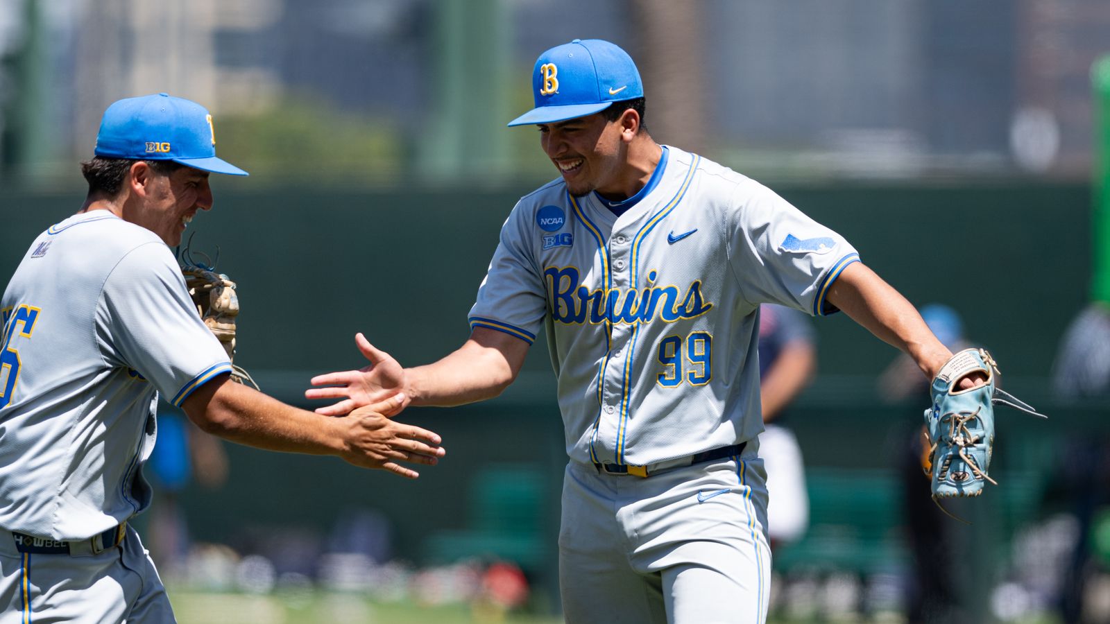 Angel Cervantes celebrates with UCLA teammates