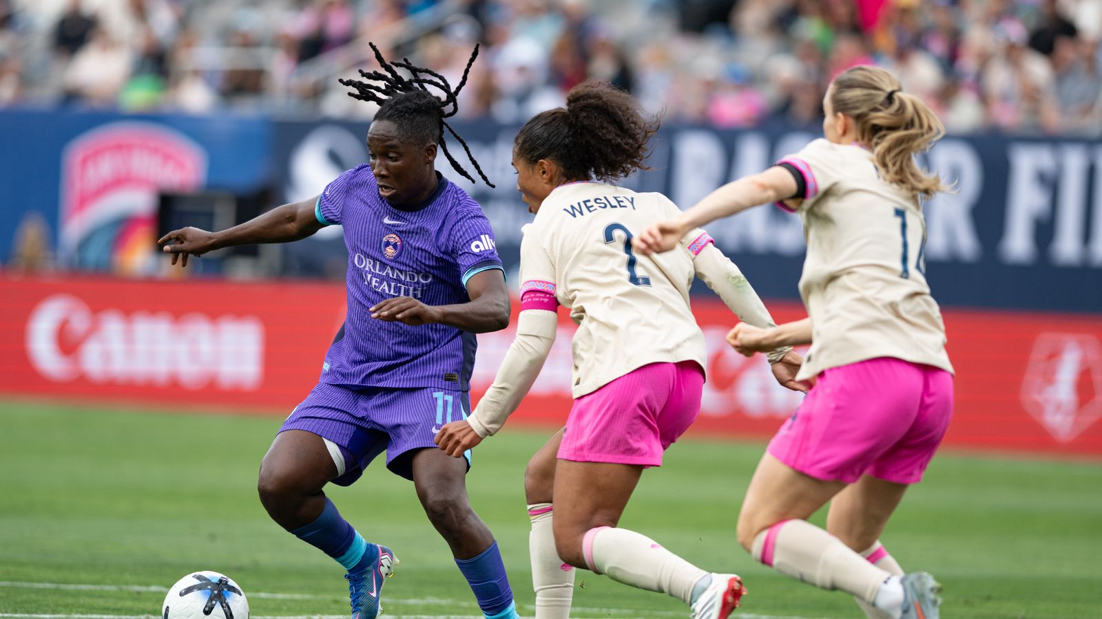 Barbra Banda hustles to maintain possession for Orlando Pride