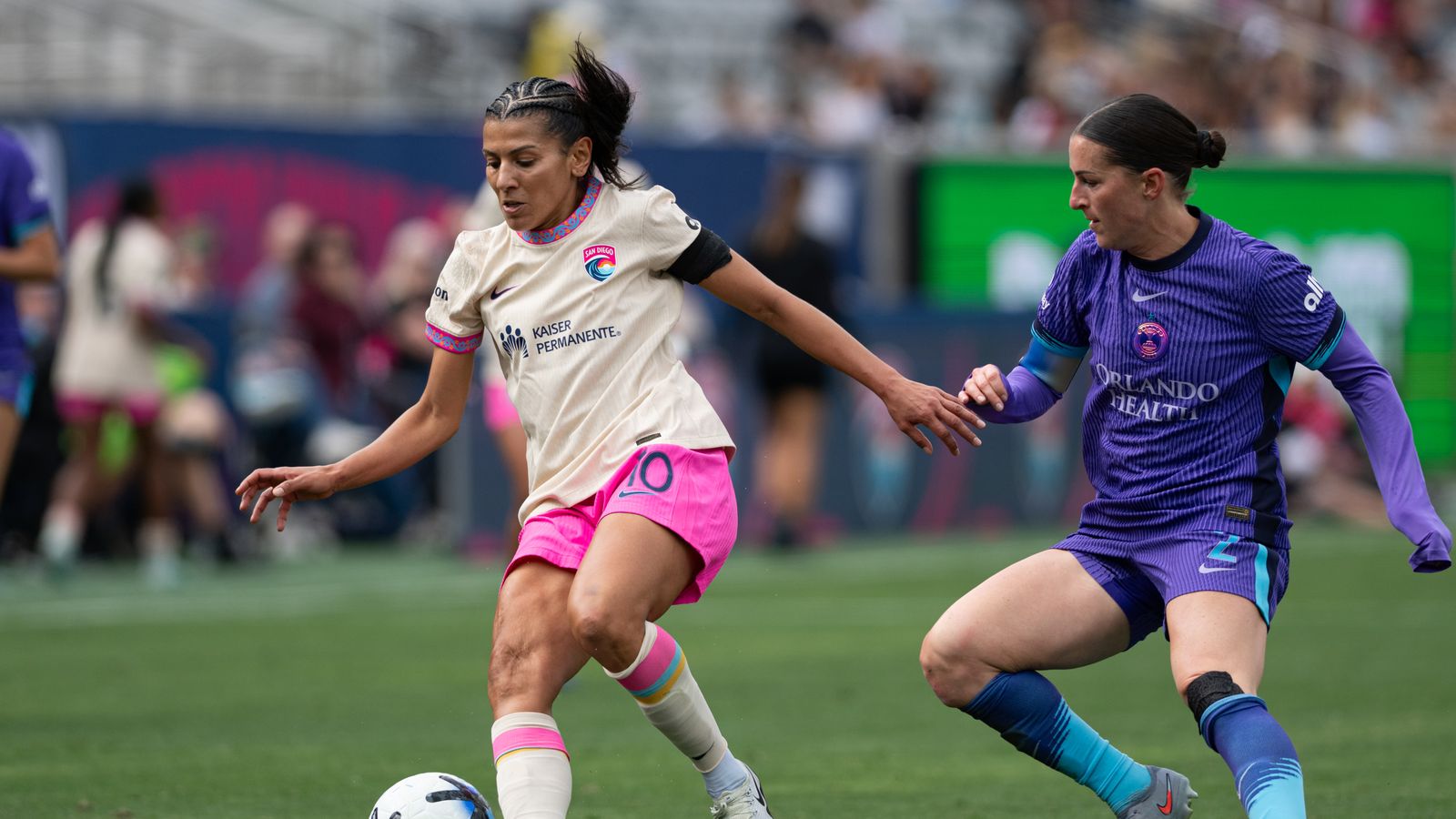 Kenza Dali maintains possession in midfield battle