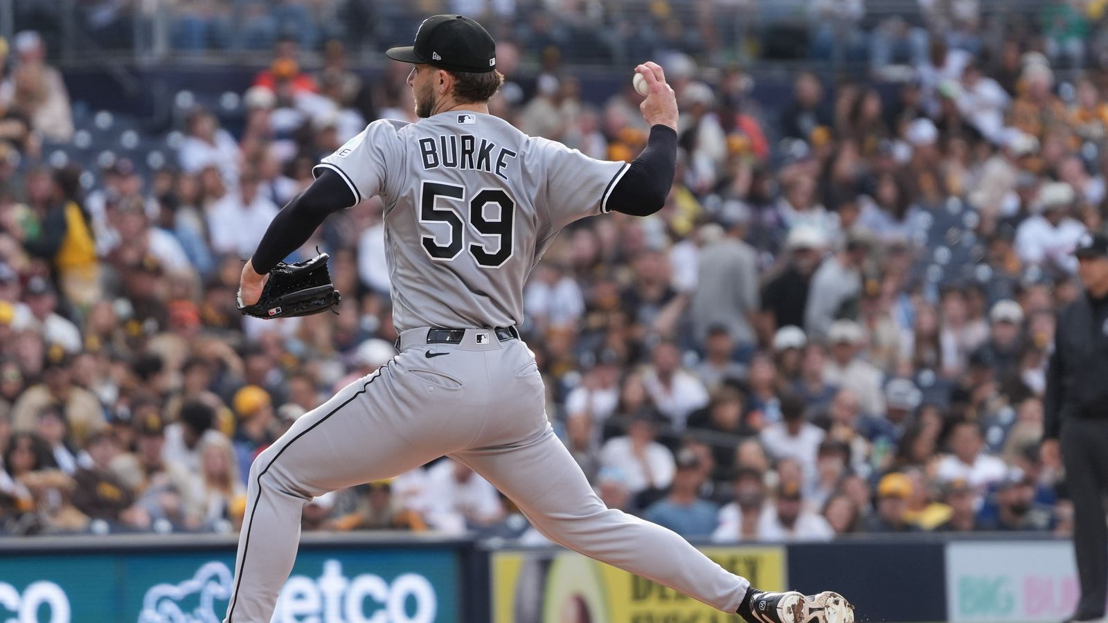 White Sox starting pitcher Sean Burke (59) pitches the ball