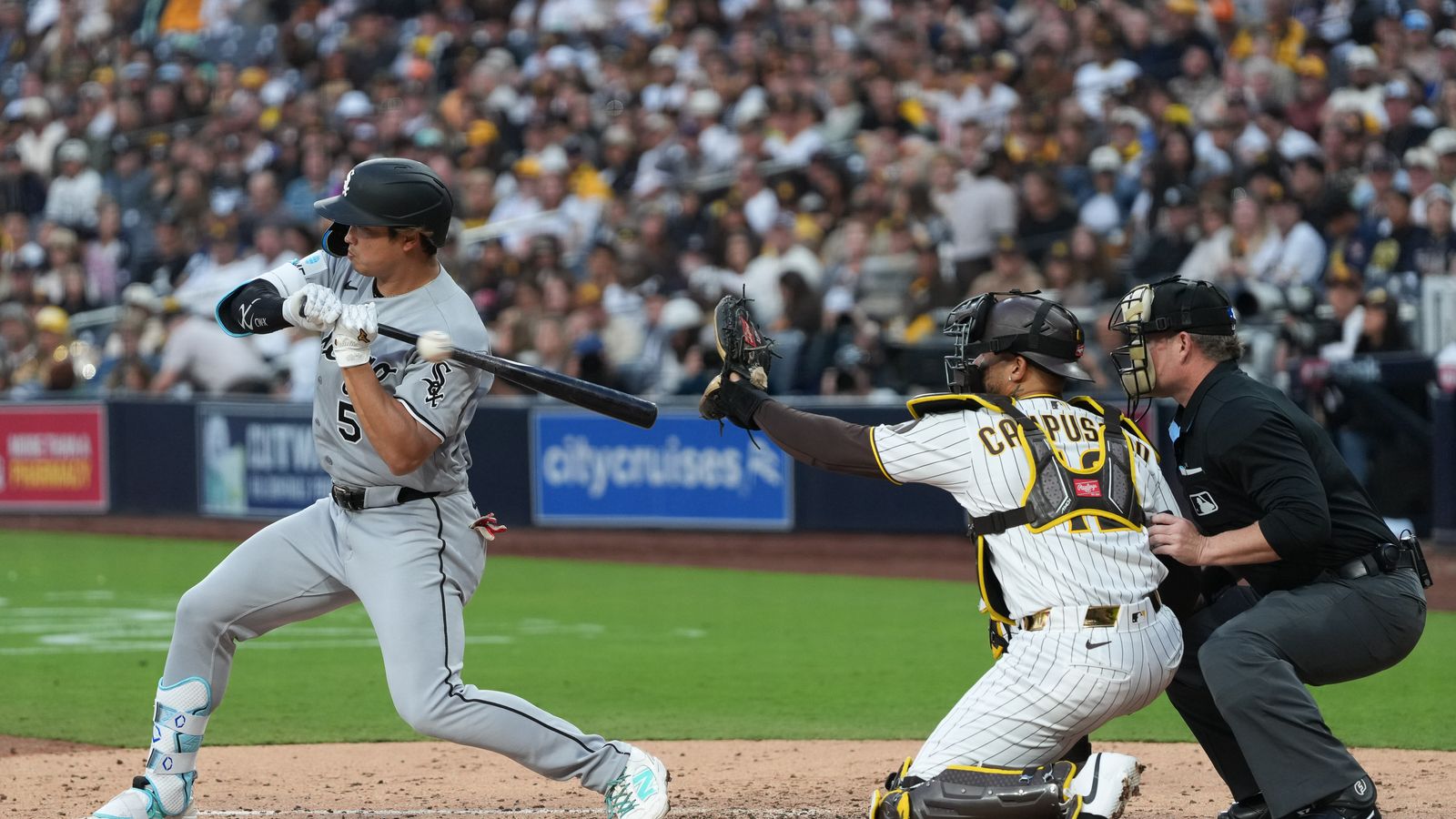 White Sox first baseman Munetaka Murakami (5) lets the pitch go by