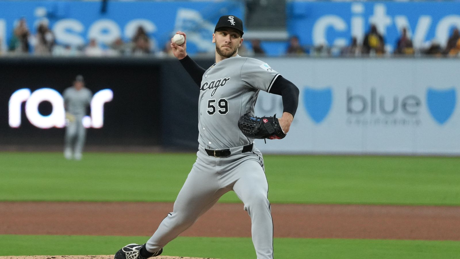 White Sox starting pitcher Sean Burke (59) pitches the ball