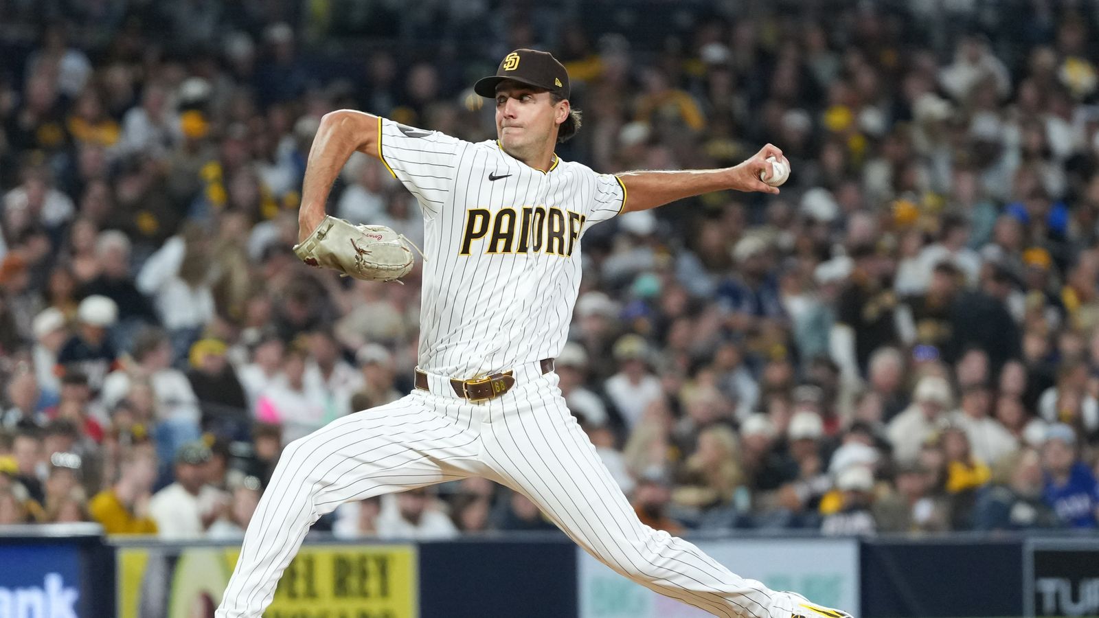 Padres relief pitcher Kyle Hart (68) pitches the ball