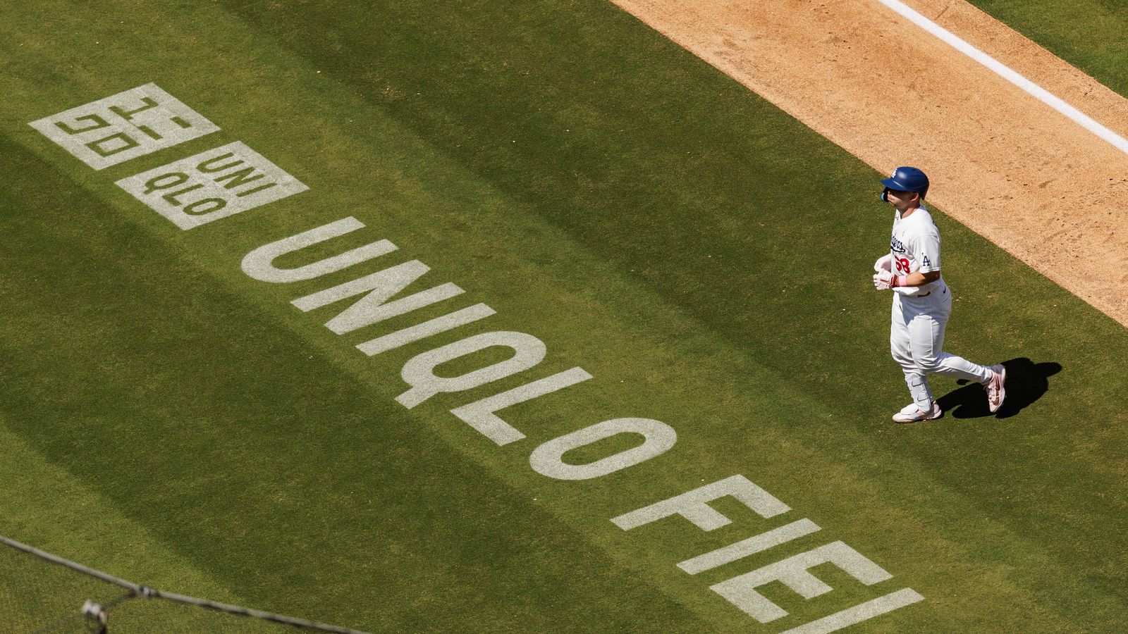 Dalton Rushing heads to the dugout at Dodgers Stadium.