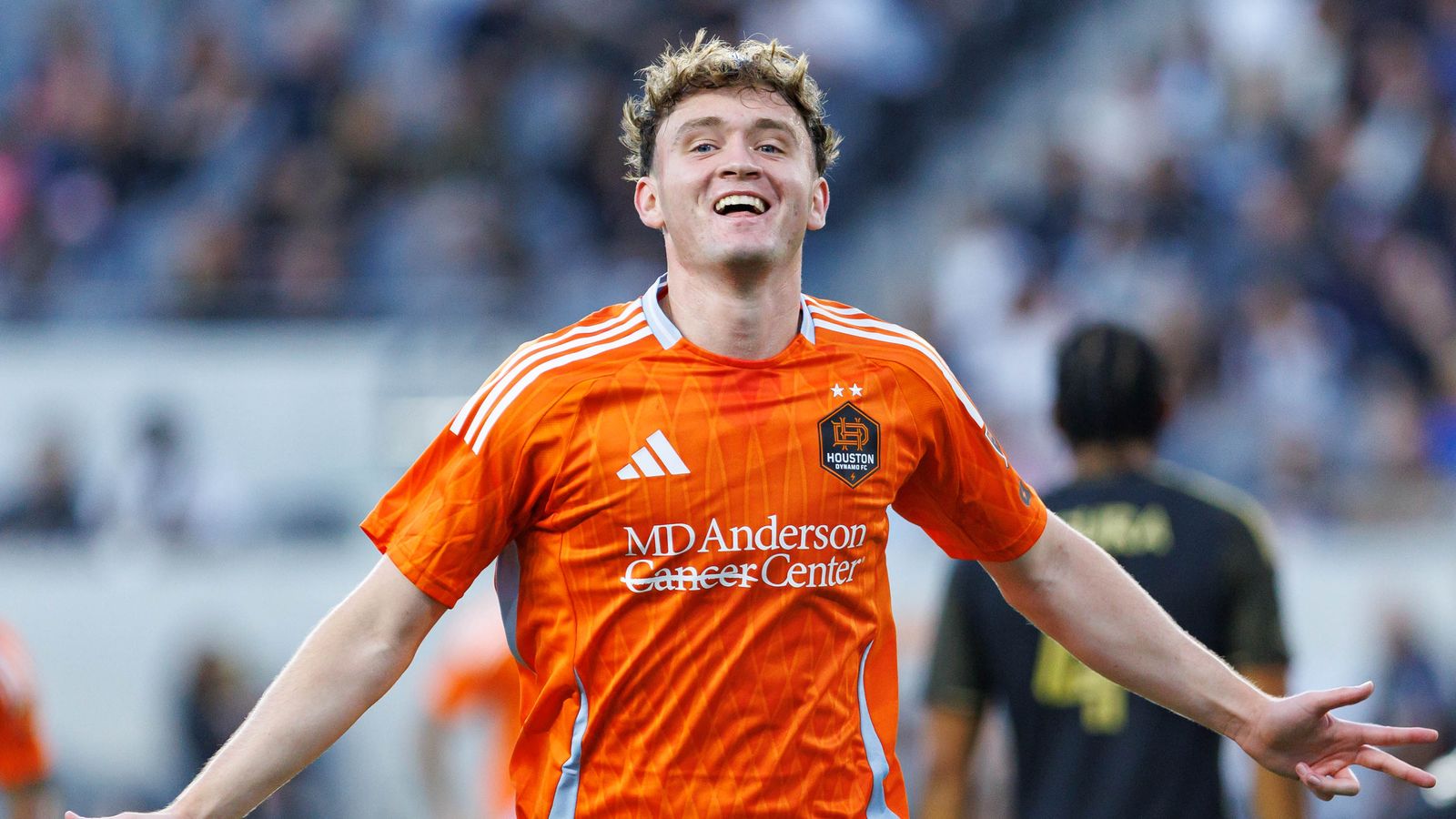 Jack McGlynn #8 of Houston Dynamo FC celebrates scoring against LAFC