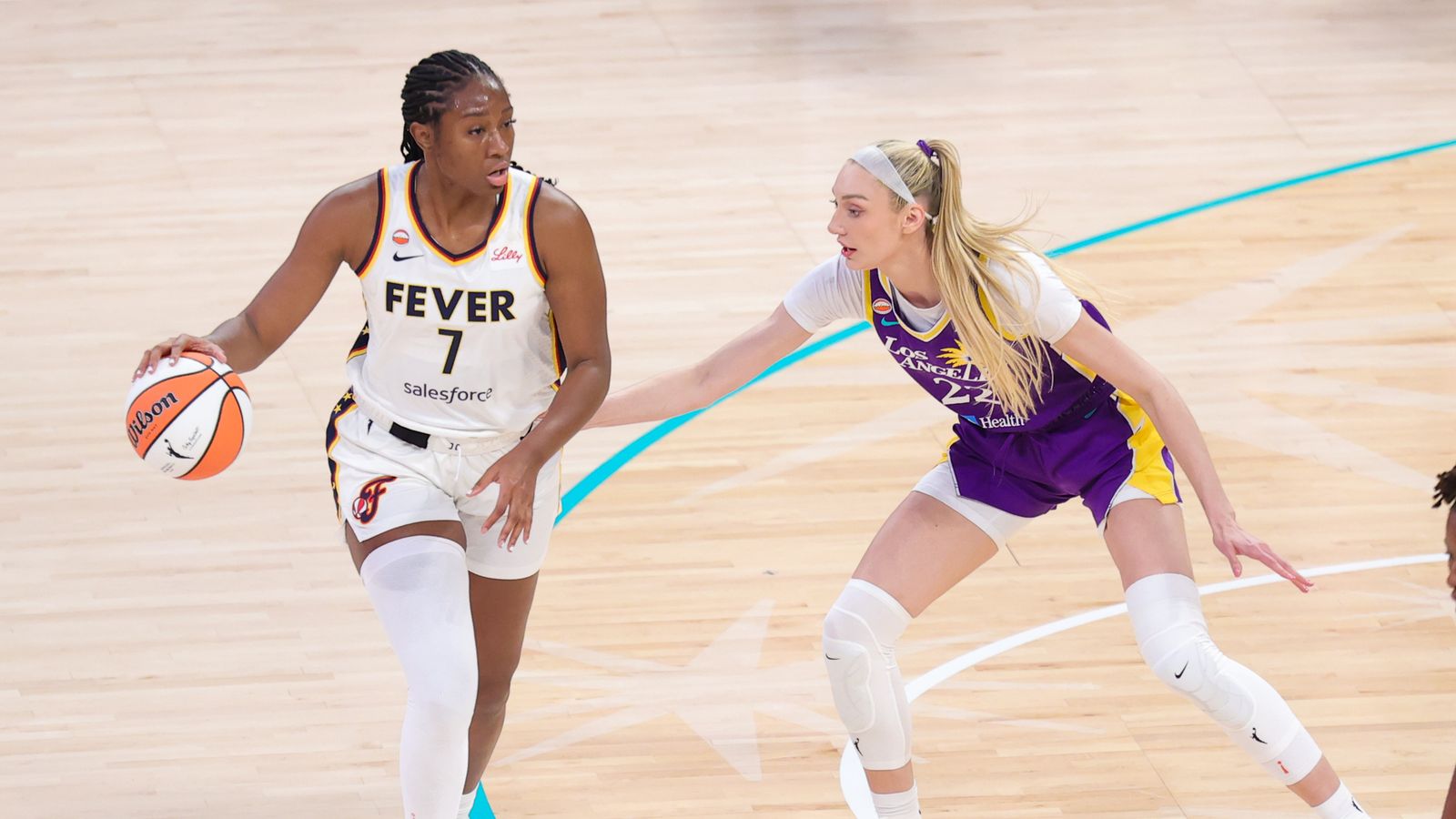 Cameron Brink defends against Aliyah Boston in WNBA game