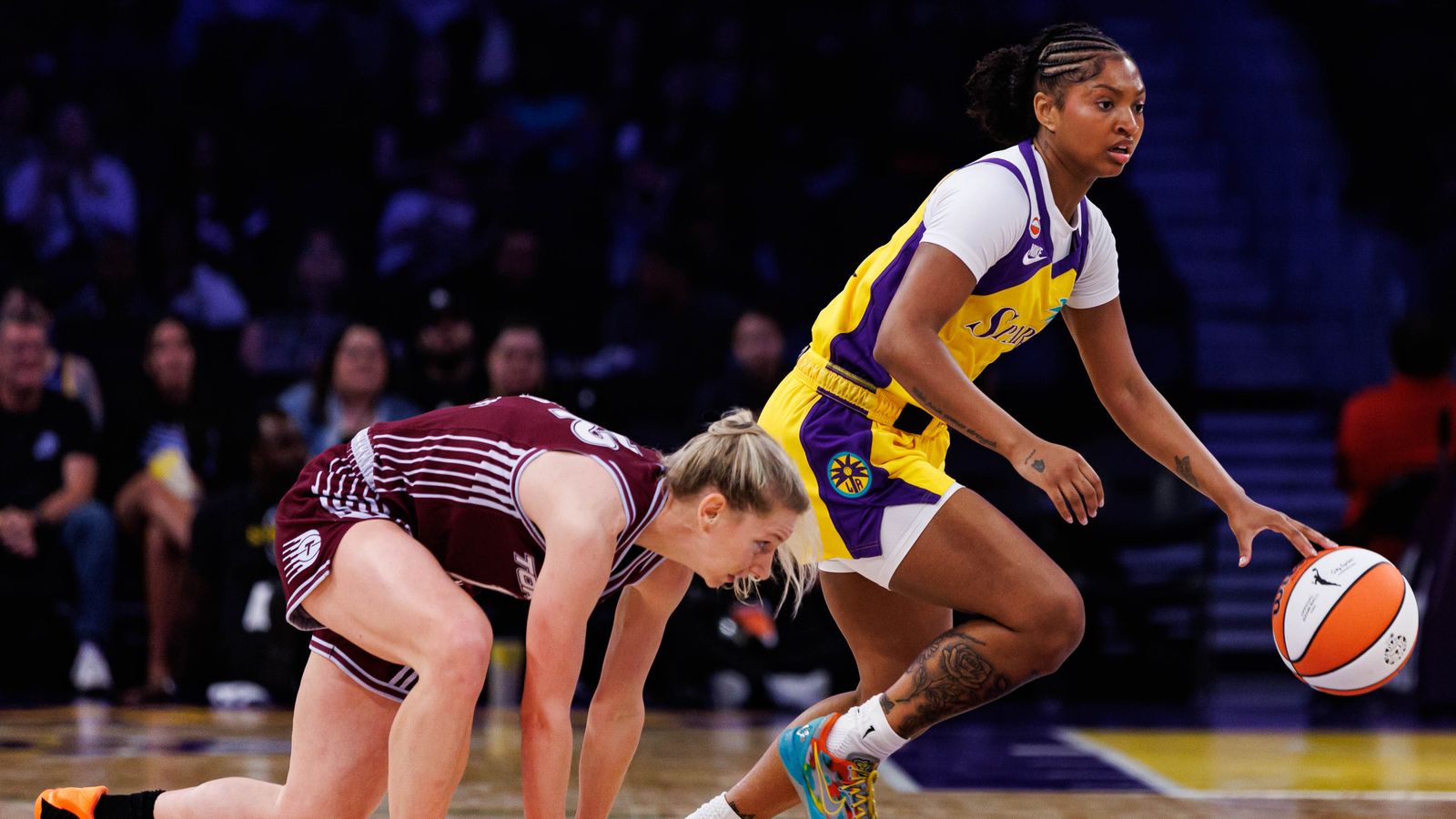 Chance Gray handles the ball in a WNBA game against the Tempo.