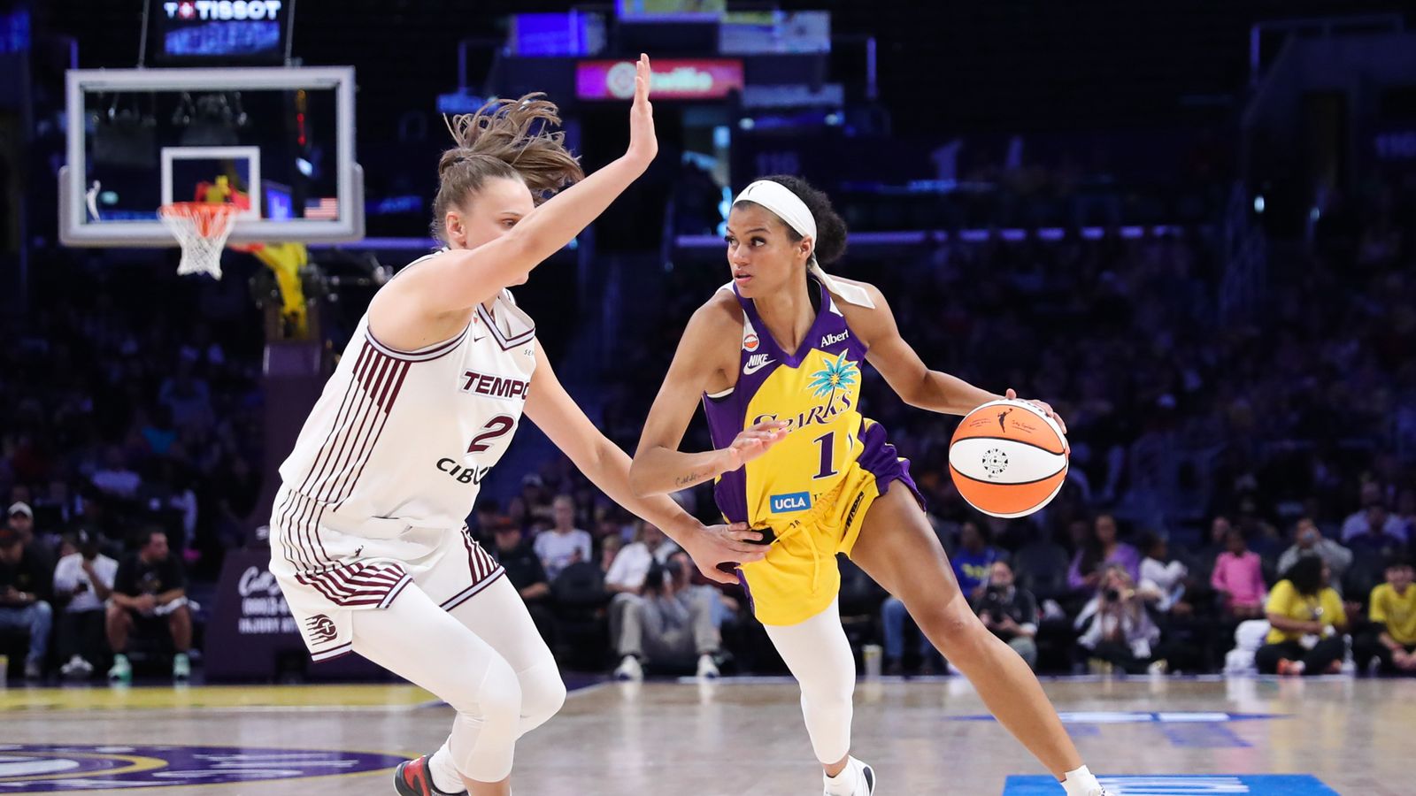 Rae Burrell dribbles during a game against Toronto Tempo