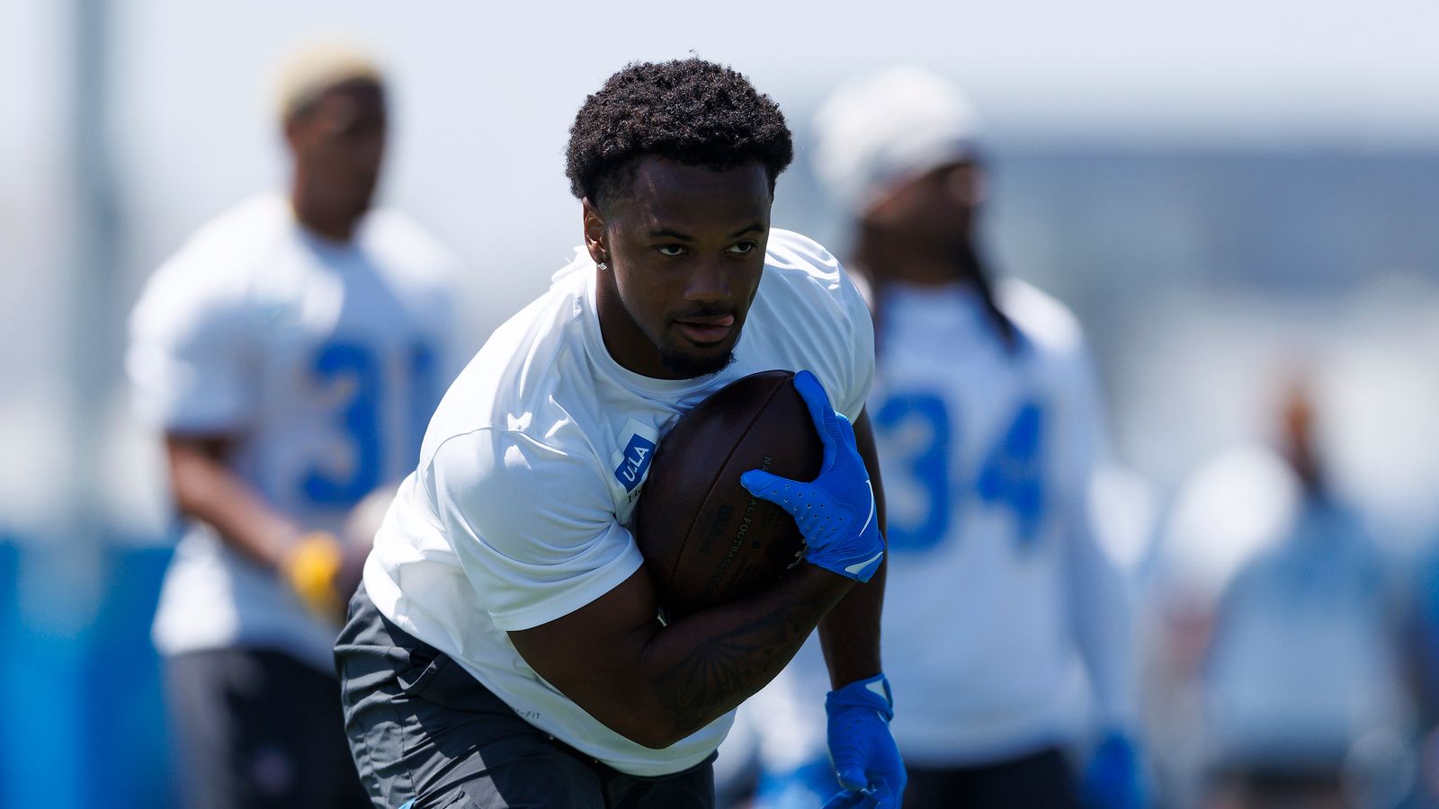 Amar Johnson #35 sprints with the ball in practice