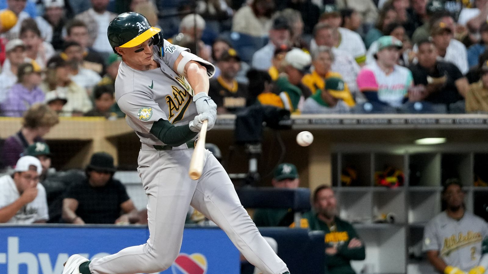 Zack Gelof in batting action during Padres vs Athletics game.