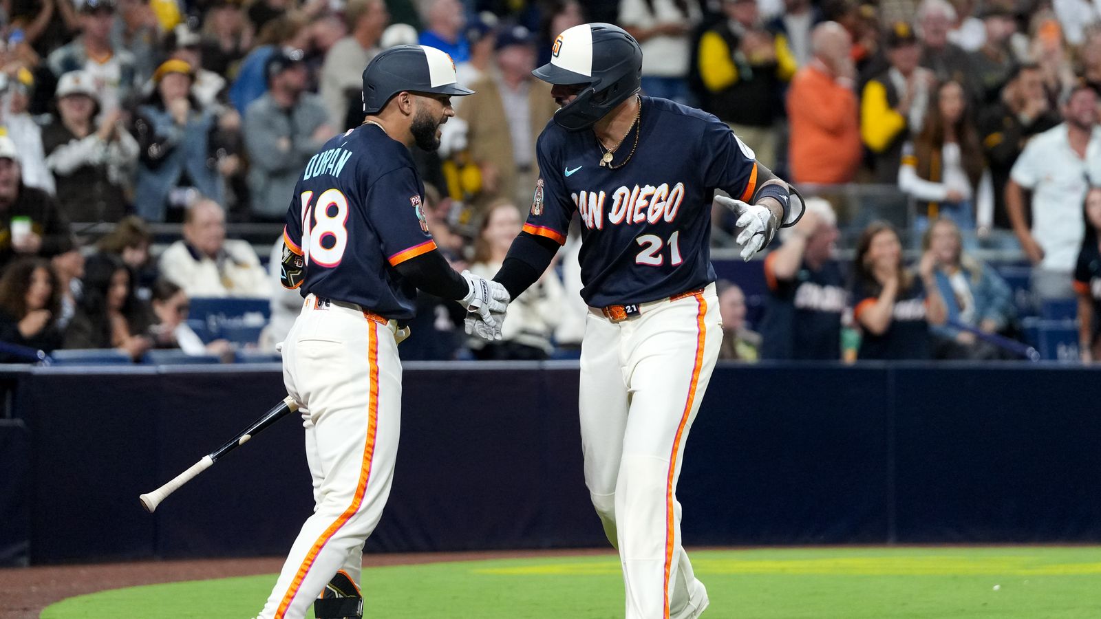 Nick Castellanos celebrates a home run with Rodolfo Durán.
