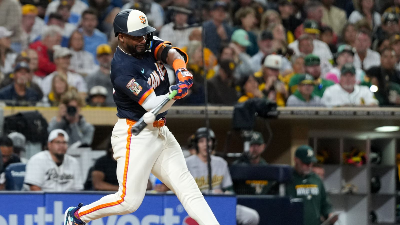 Miguel Andujar hits a foul ball in Padres vs Athletics game.