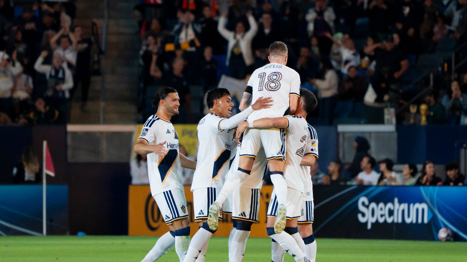 LA Galaxy team celebrates a goal in match against Dynamo