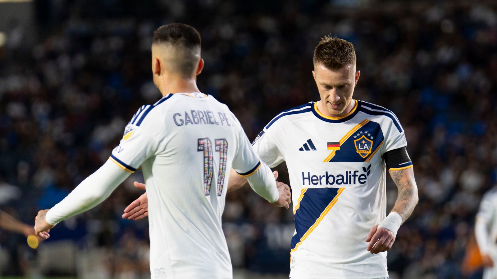 Marco Reus and Gabriel Pec celebrate during the Galaxy game
