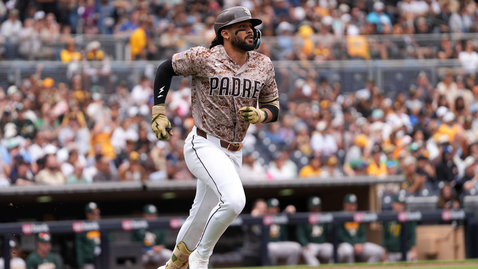 Fernando Tatis Jr. running to first base
