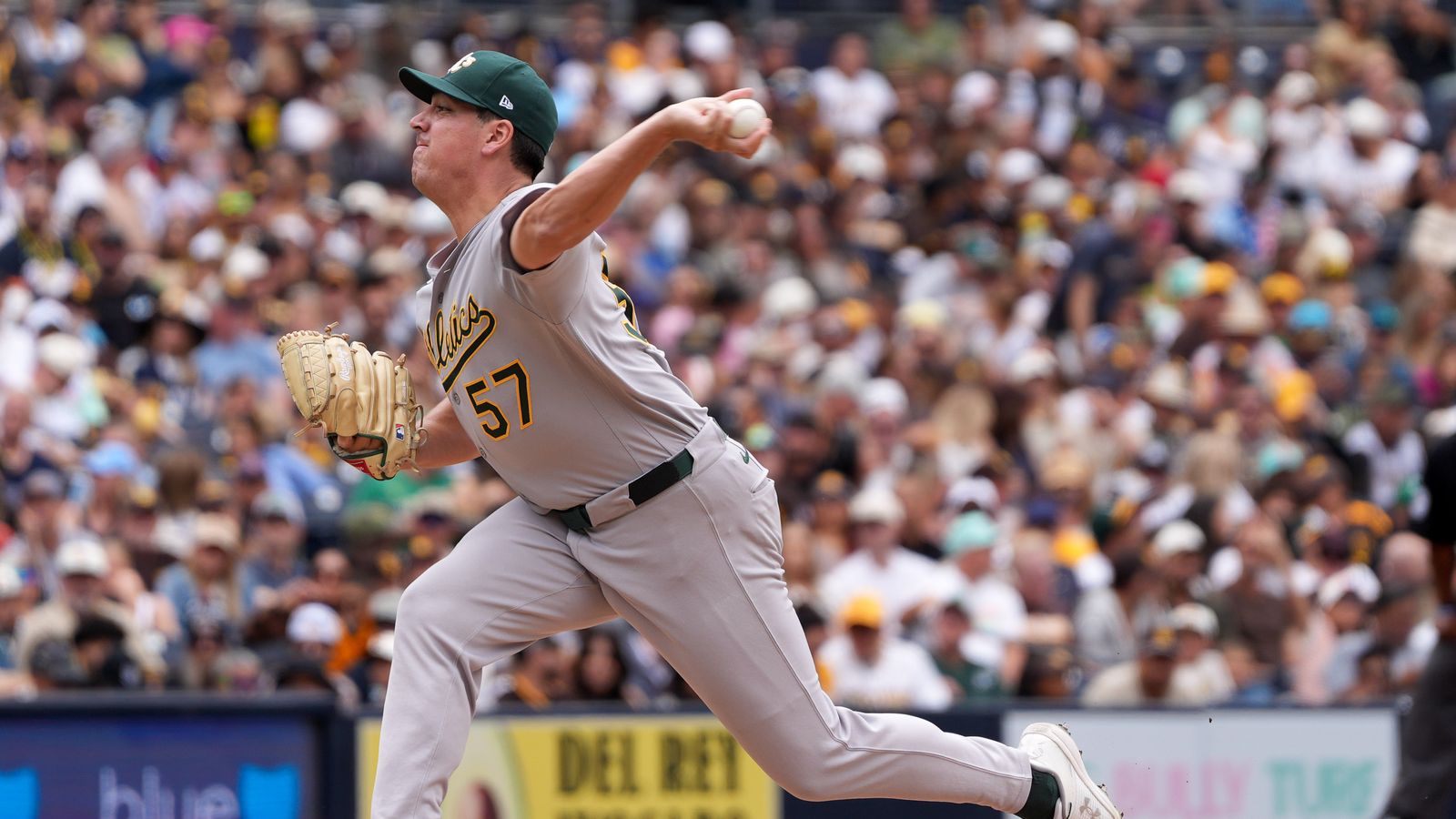 Jacob Lopez pitches in a game against the Padres