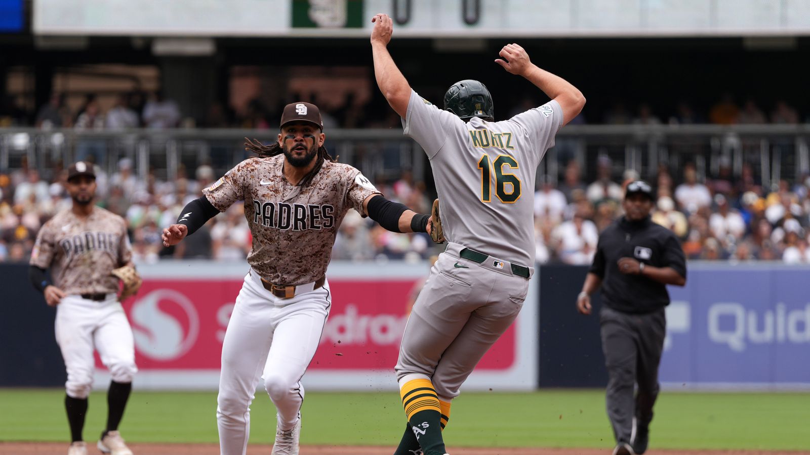Fernando Tatis Jr. gets Nick Kurtz out at second
