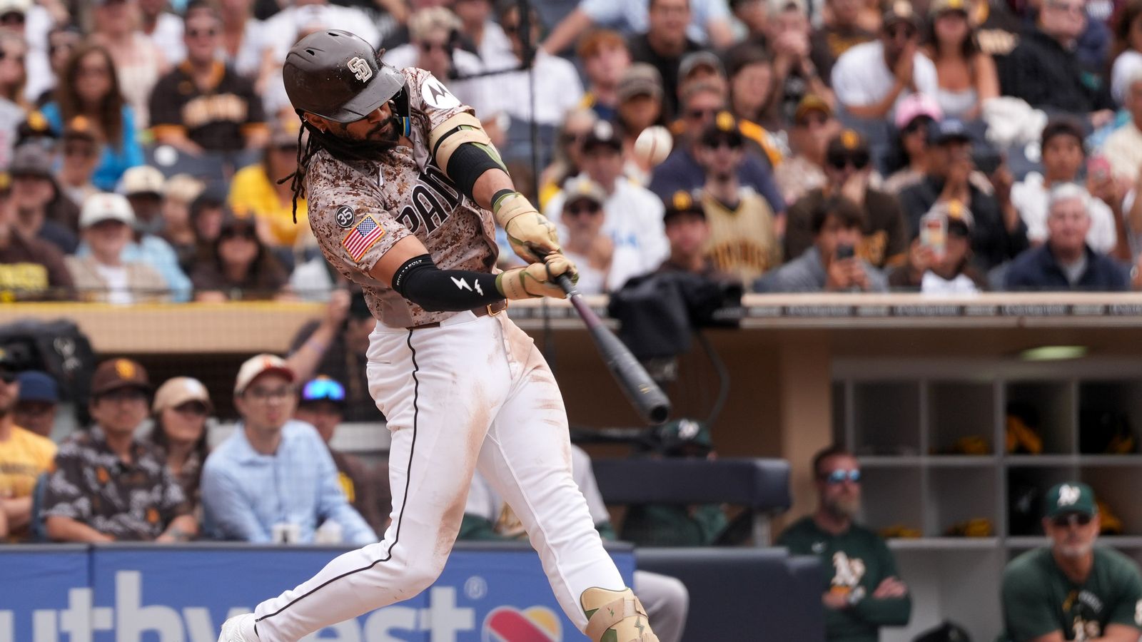 Fernando Tatis Jr. hits the ball at Petco Park