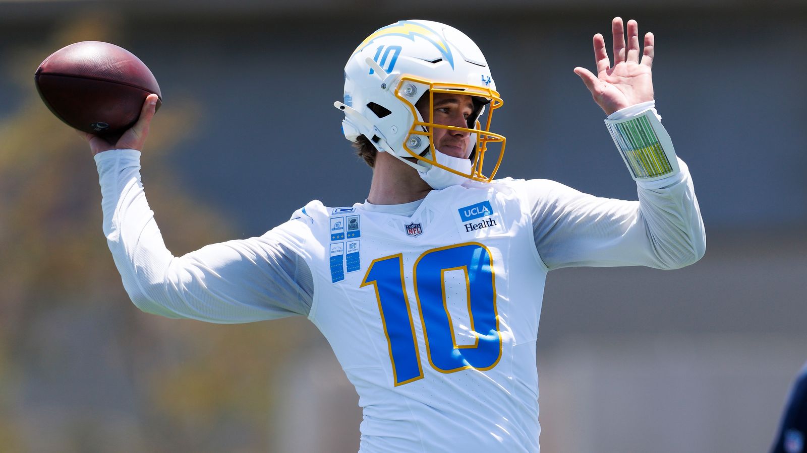 Justin Herbert throws during Chargers OTA at The Bolt.