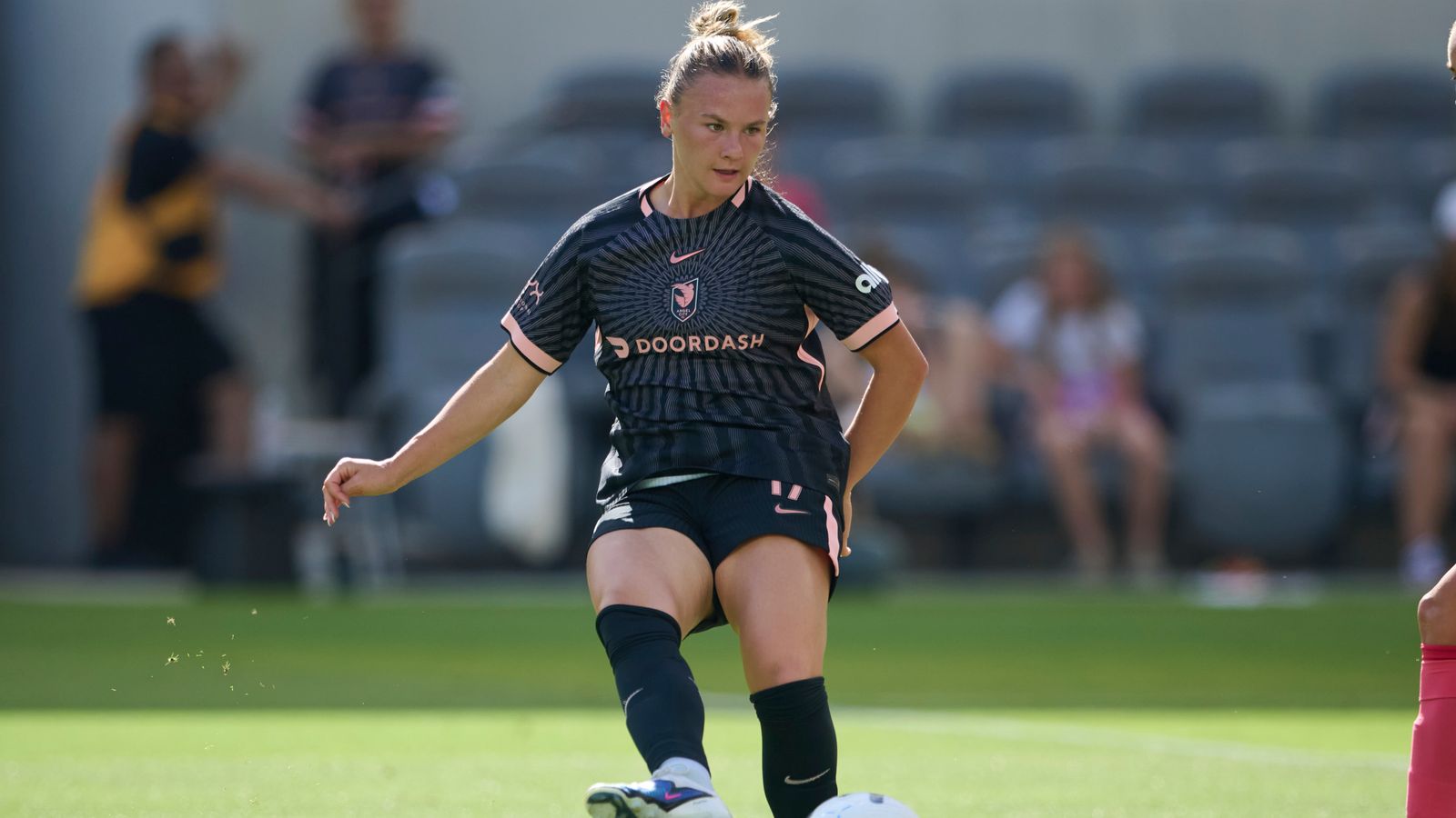 Kennedy Fuller #17 passes the ball in NWSL match