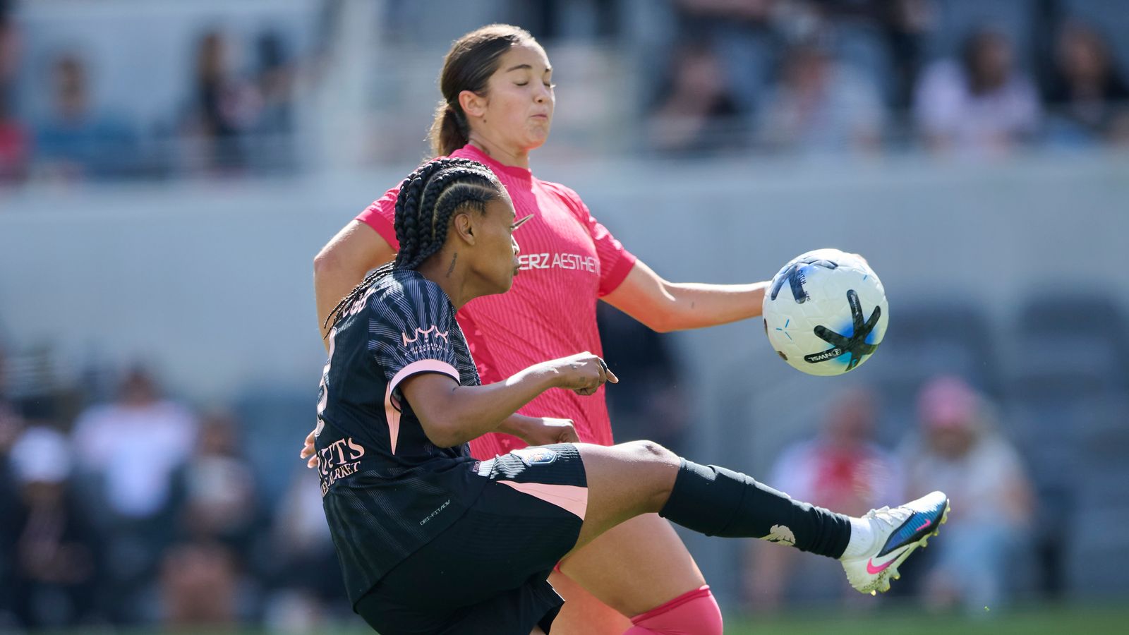 Ary Borges #8 fights for the ball in intense NWSL match