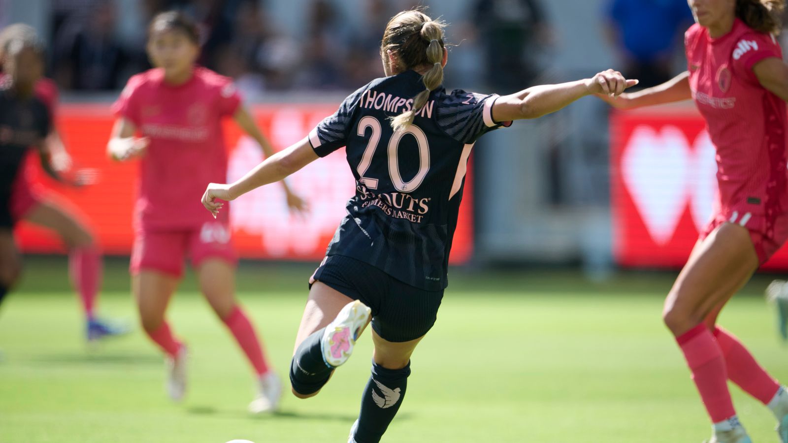 Gisele Thompson #20 of Angel City FC makes a pass in NWSL action